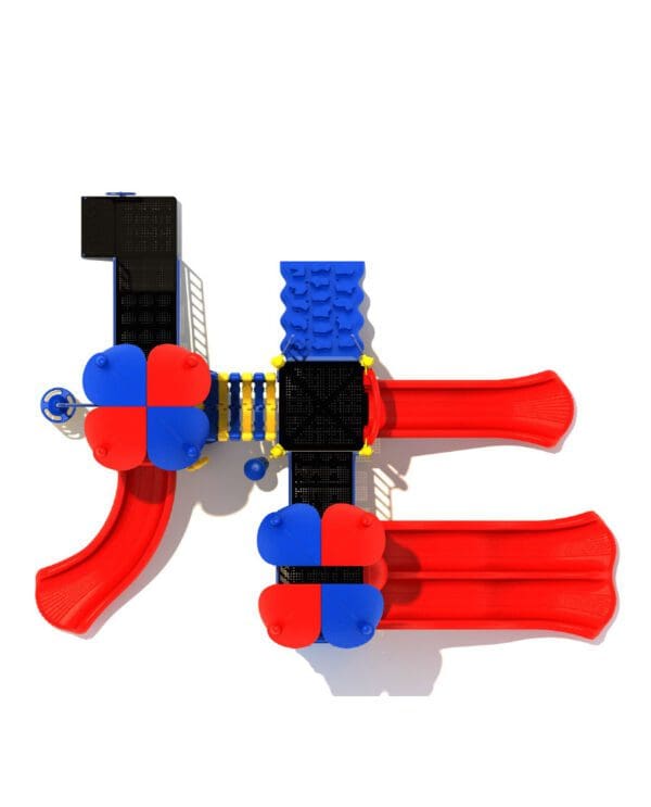 A red and blue toy gun is laying on the ground.