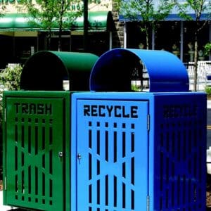 Green trash can, blue recycling bin.