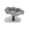 Grey wave spinner playground equipment.