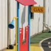 Colorful gas station play structure.
